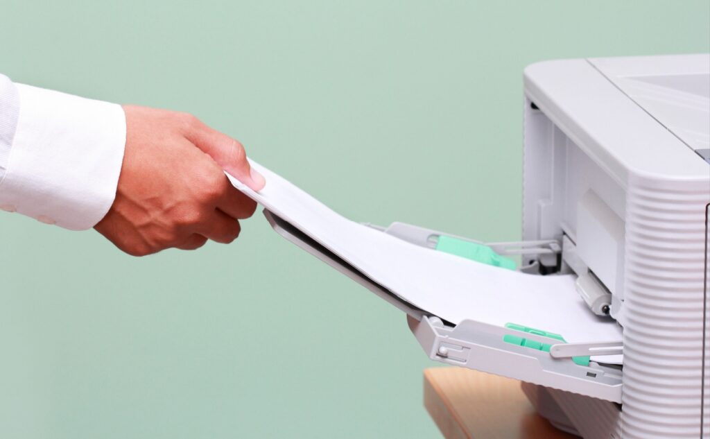 is it cheaper to buy or lease a copier?